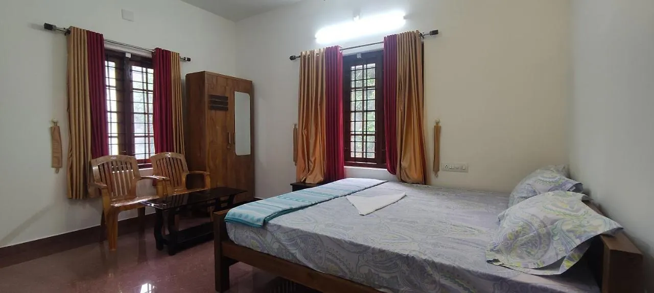 Titli Holiday Homes Anaviratty Quarto em Acomodações Particulares
